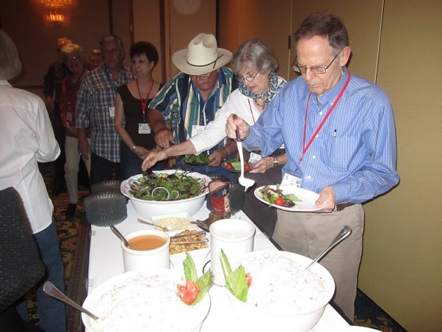 BOBBY BLACK AND WIFE EDNA CHECKING OUT THE SALAD