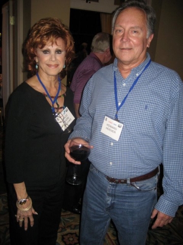 ANNLEE MOORE HASCHKE AND HOWARD HOOVER(ENJOYING A LITTLE OF THE BUBBLY)