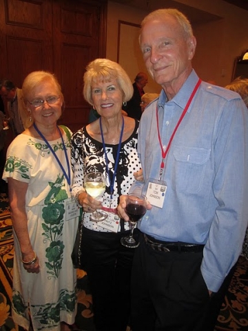 KAY JESTER BYERLY(CHEERLEADER) FAY LOU FRITZ JOHNSON AND HUSBAND TOM JOHNSON SEEM TO BE HAVING A GOOD TIME