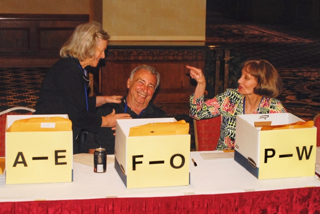 shirley kohler(registration chairperson)  explaining to her committee members janice fleming, eddie engbrock that its her way or the highway