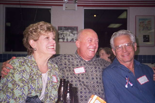 Barbara Bayer Singleton Don Robinson, David Abright at the 45th--discussing cheerleading